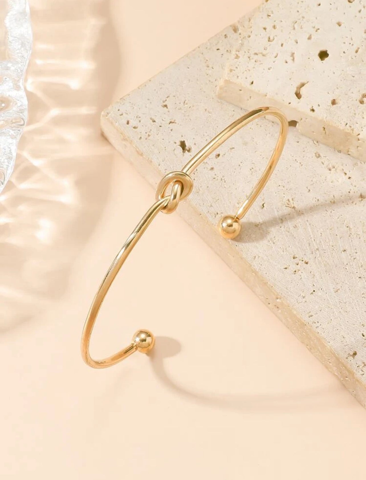 Knot bangle bracelet